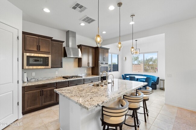 Building Photo - 10812 E Tesla Ave