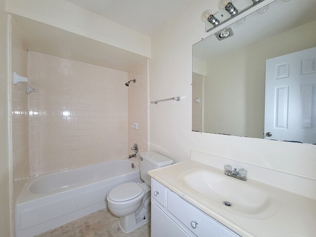 Building Photo - This stunning single-story upstairs unit o...
