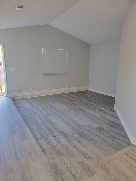 Large Living Room with Brand New Floors Throughout home - 3621 NW 193rd St