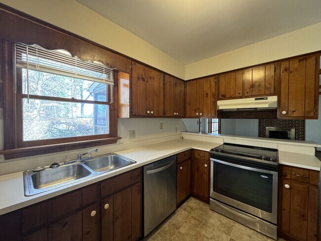 Building Photo - Introducing a charming Colonial style home...