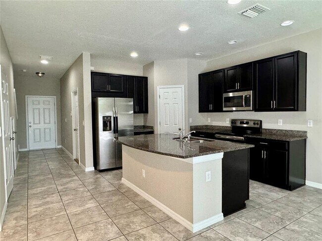 Building Photo - 7208 Grand Elm Dr