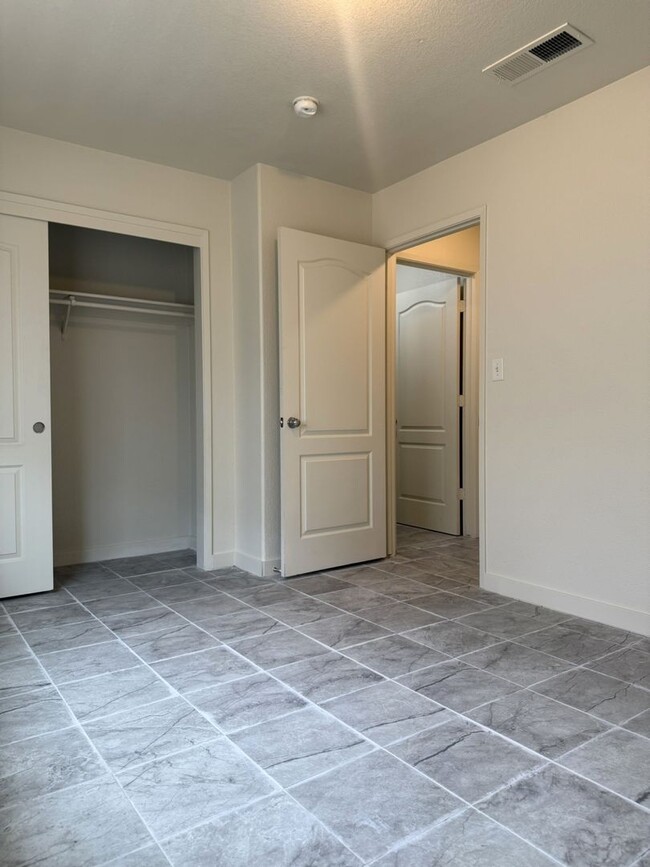 Building Photo - Available Now!!! With fresh paint and new ...
