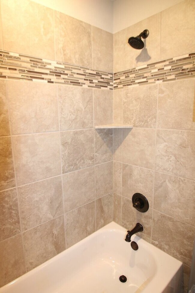 Building Photo - SENSATIONAL 3/2/ Duplex Home Coming Soon i...