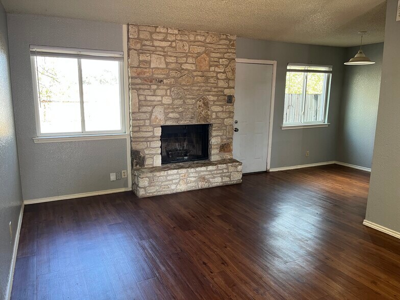 Living room and dining area - 926 Chisholm Cv