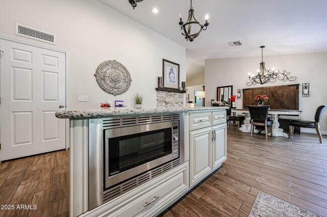Building Photo - 9085 E Windrose Dr