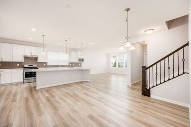 Building Photo - Updated 3-Bedroom Home with 3 Baths, Open-Concept Layout, Luxury Flooring & Bright Modern Kitchen