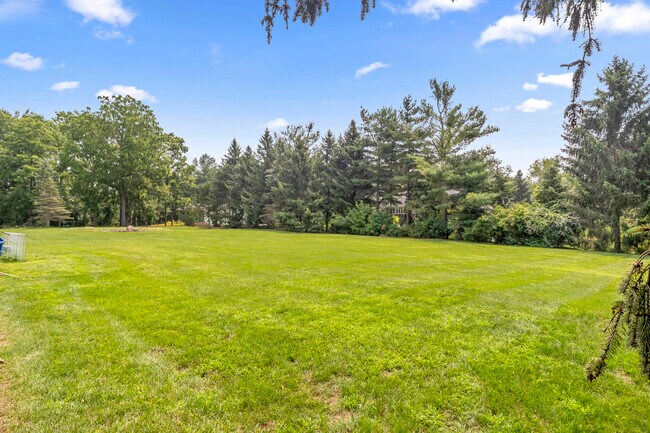 Building Photo - 46105 W Seven Mile Rd