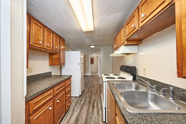 Building Photo - Coming Soon: 2 BR unit that includes water, trash, and yard care.