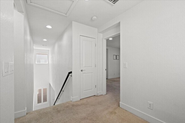 Building Photo - Modern Gated 3 Bedroom Retreat with Loft & Entertainer’s Backyard