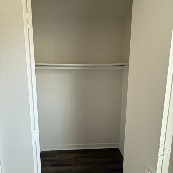 Primary bedroom closet - 8632 Conklin Pl