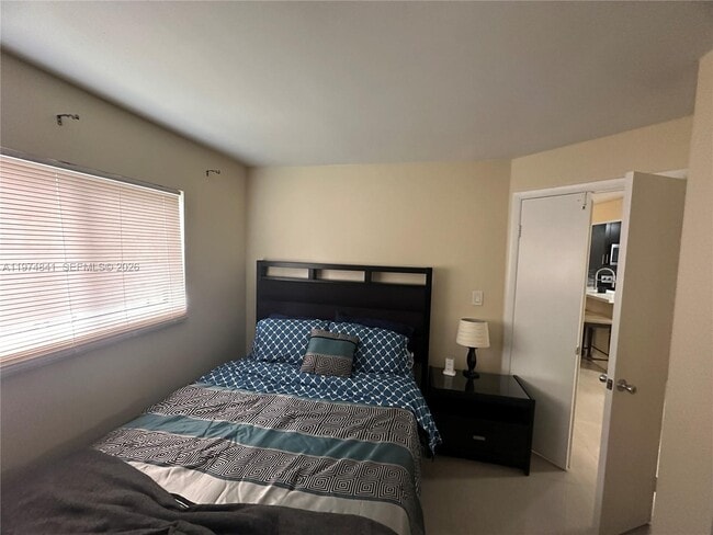 Building Photo - 9491 Palm Cir S