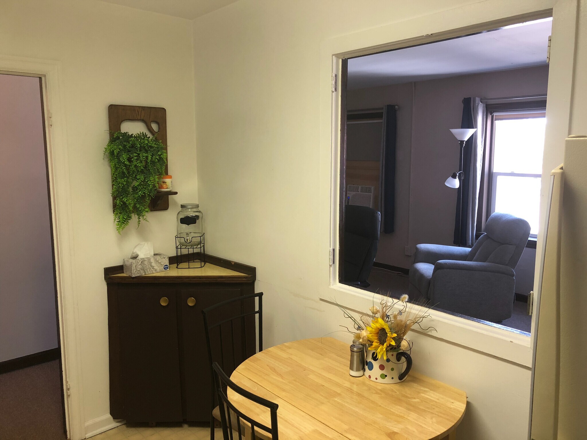 Kitchen looking into LV Room - 118 E Washington St