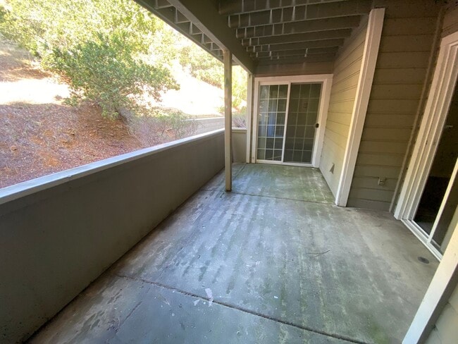 Building Photo - Amazing Condo Nestled in the Oakland Hills W/ Parking, Laundry & Patio!