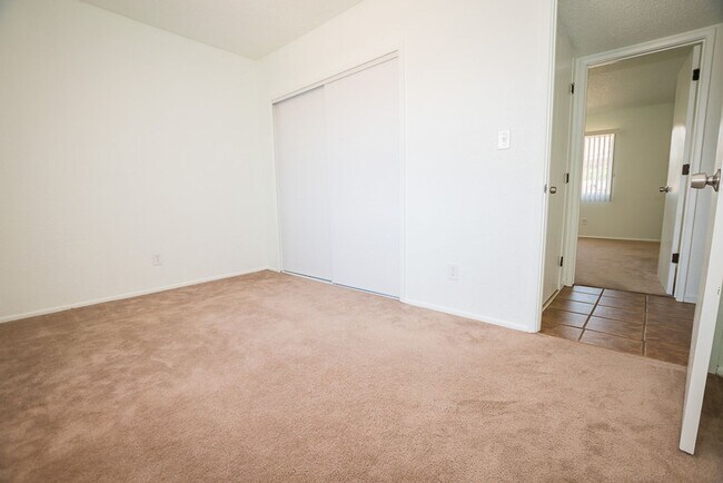 Building Photo - Charming Property Features 3 Bedrooms, 2 B...
