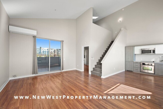 Building Photo - Views, Views, Views! Stunning Top-Floor Little Italy 2-bedroom Loft at The Waterfront!