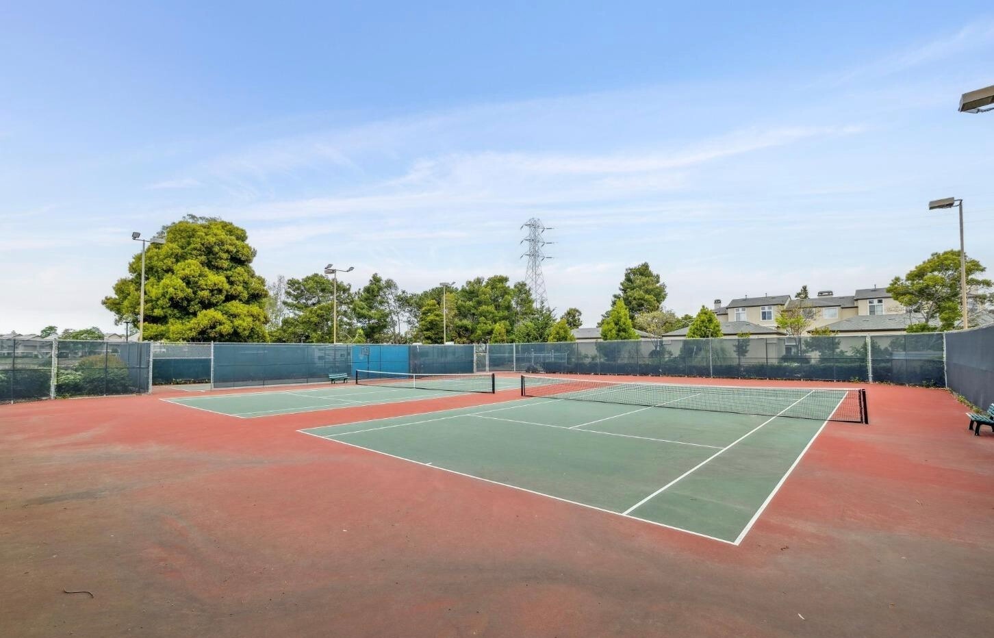 Two of 3 tennis courts - 820 Sea Spray Ln