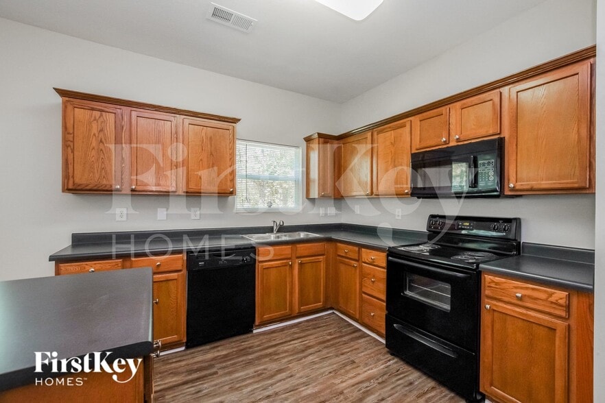Building Photo - 7003 Advocator Ln
