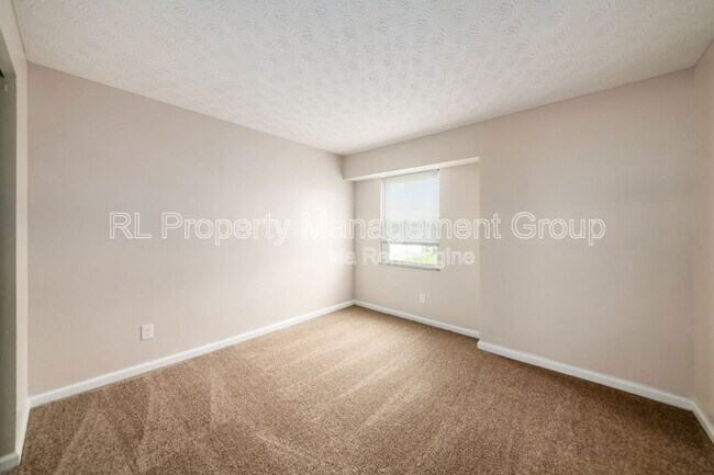 Building Photo - 7179 Feather Ct