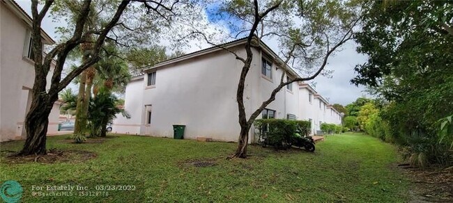 Building Photo - 7661 Tamarac Island Cir