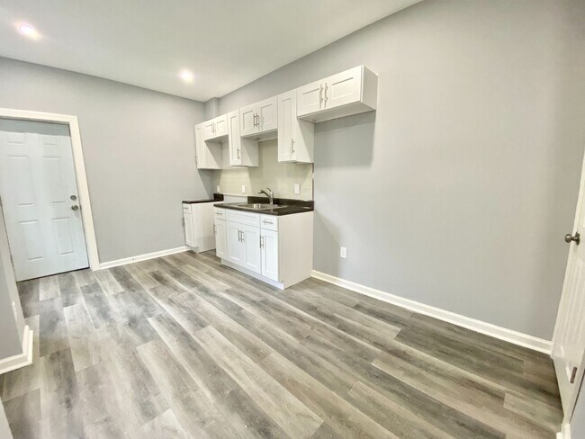 Building Photo - Three-Bedroom Home with a Private Back Patio