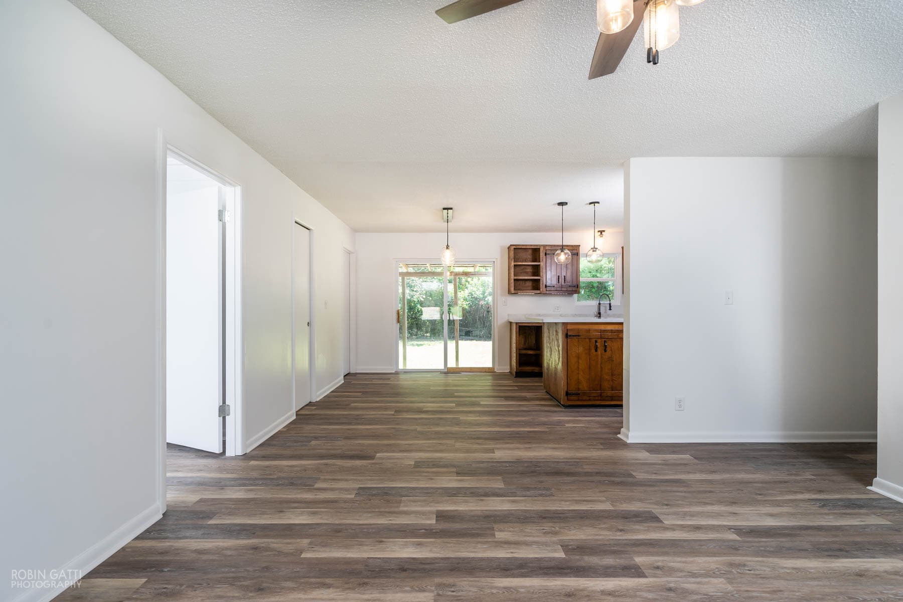 View of dining area and kitchen from living room - 502 Cherokee Court
