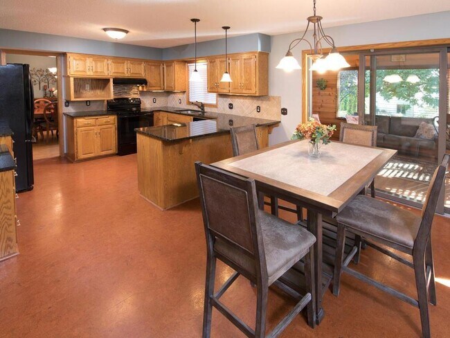 Building Photo - Elegant 2-Story has 4 BRs on Upper Level, Office, 2 Family Rooms, Fireplace & More!