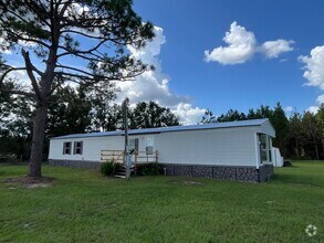 Building Photo - 3 bedroom 2 bath Mobile Home on 1 acre in ...