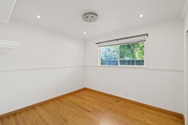 Building Photo - POOL PARADISE IN A COVETED NEIGHBORHOOD STYLISH UPGRADES | EXTREME CONVENIENCE