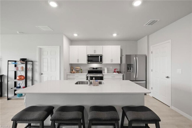 Building Photo - 2621 Table Coral Trl