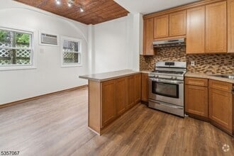 Building Photo - 310 Paterson Plank Rd