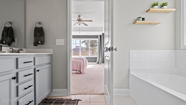 Building Photo - 4BR Home in The Landing at Mill Creek | Bonus Room + Fenced Yard w/ Pergola