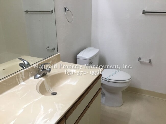 Building Photo - Spacious 2-Bed, 2-Bath Condo with Fireplac...
