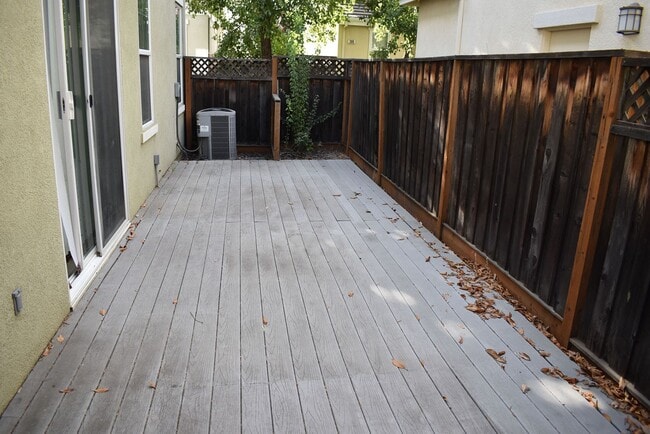 Building Photo - Great home with solar, centrally located n...