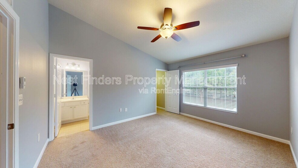 Building Photo - 6937 Woody Vine Dr