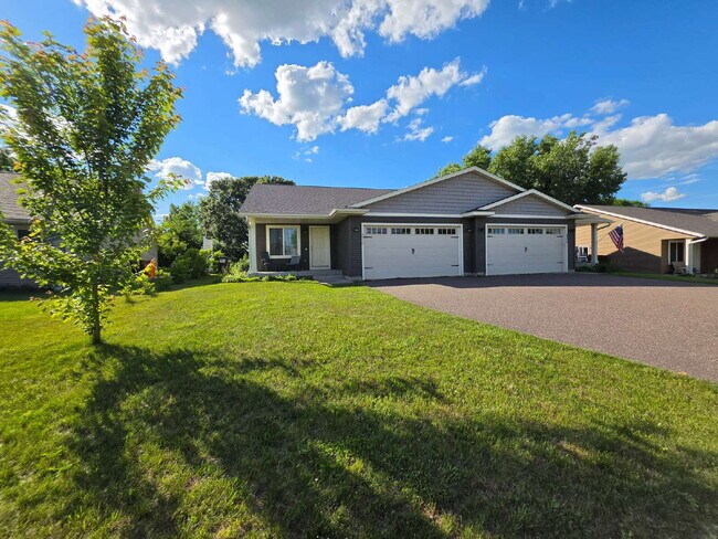 Building Photo - FREE SEPTEMBER RENT for this Spacious 4-Bedroom Home with Vaulted Ceilings with Finished Basement...