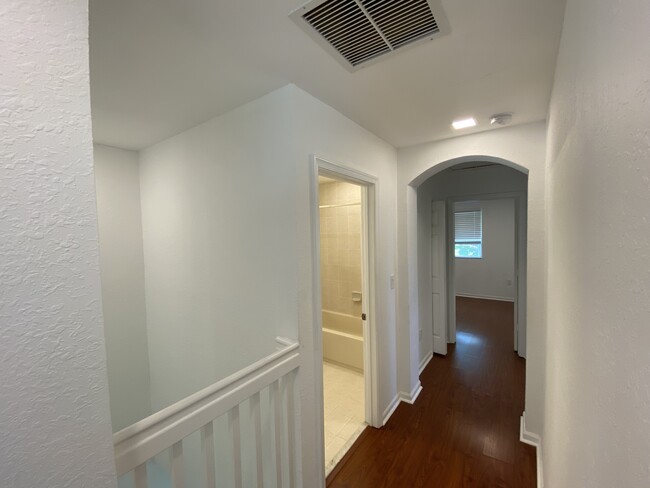 Hallway with entrance to first bathroom - 2451 SE 14th Ave