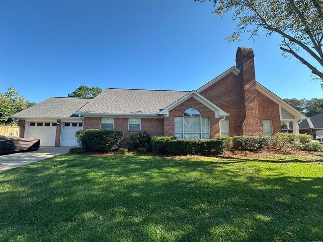 Building Photo - Gorgeous 3 Bed Brick Home