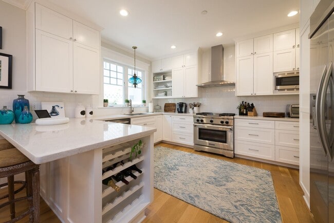 Building Photo - Four-bedroom home in the heart of the Village, offered furnished long-term lease. Ideally located...