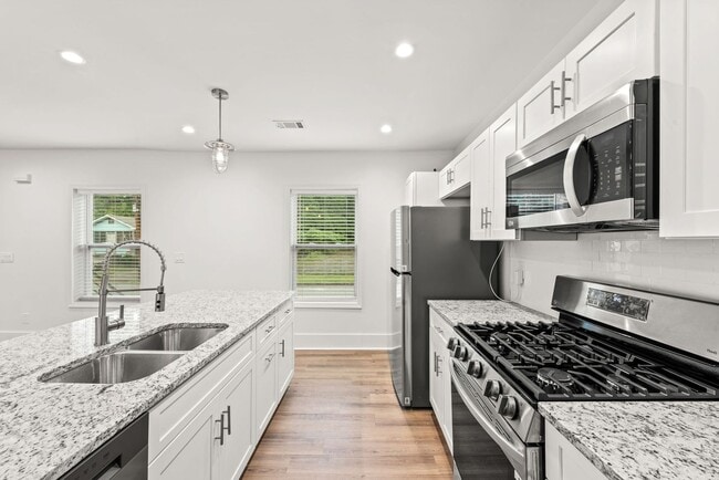 Building Photo - Location, Location - Duplex Unit A - 636 Francis PL NW/ 2 bedroom, 2 bath - off street parking $1...