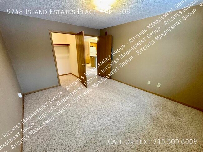 Building Photo - 9748 Island Estates Pl