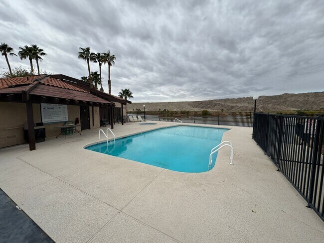 Building Photo - 2 BR Furnished Condo on the Colorado River with Utilities included