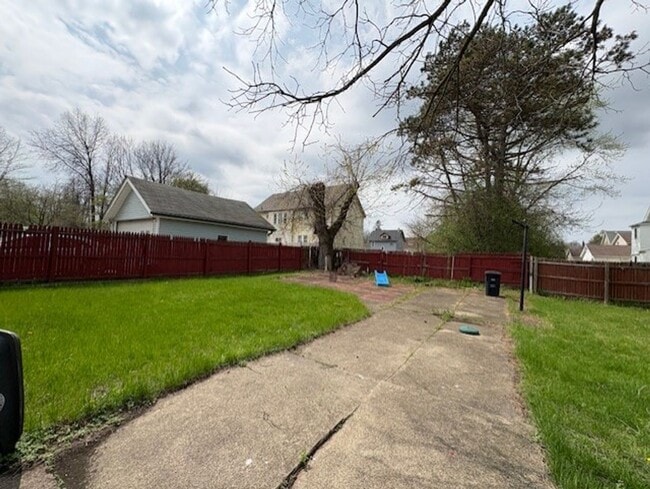Building Photo - Spacious 4-Bedroom Akron Home with Charming Kitchen Nook & Backyard & Pet Friendly