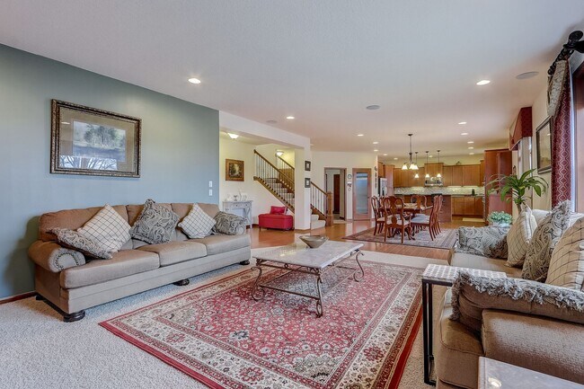 Building Photo - Grand 5 bed 4.5 bath Maple Grove Home w/ 3-Car Garage! Fully Furnished