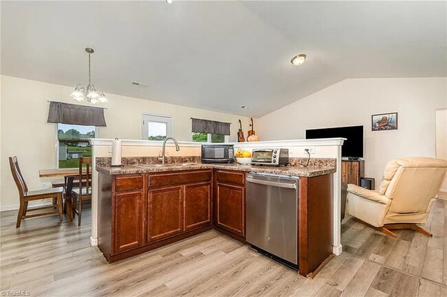 Building Photo - Earn Wealth While Leasing - Like a Homeown...