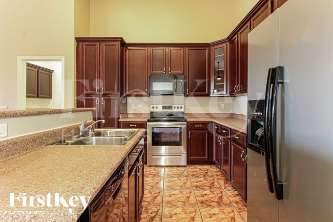 Building Photo - 14135 W Riviera Dr