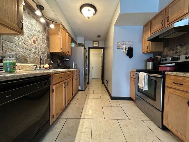 Building Photo - Introducing this fantastic townhome in the...
