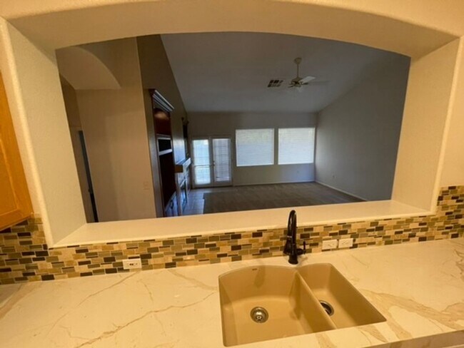 Building Photo - *WONDERFUL SINGLE STORY HOME IN GREEN VALLEY RANCH GATED COMMUNITY!!**