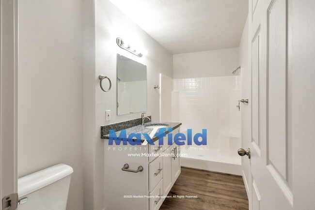 Building Photo - Pet Friendly Main Floor 3BD 2BA 2GA Unit Near Costco and High School