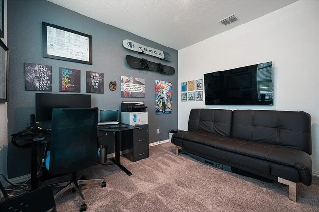 Building Photo - Stylish 4-bedroom home with quartz kitchen, luxury flooring, covered patio, and resort-style amen...