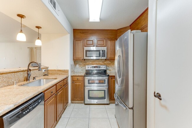 Building Photo - Bright First-Floor 2-Bedroom Condo with Private Patio in Silverado Ranch!